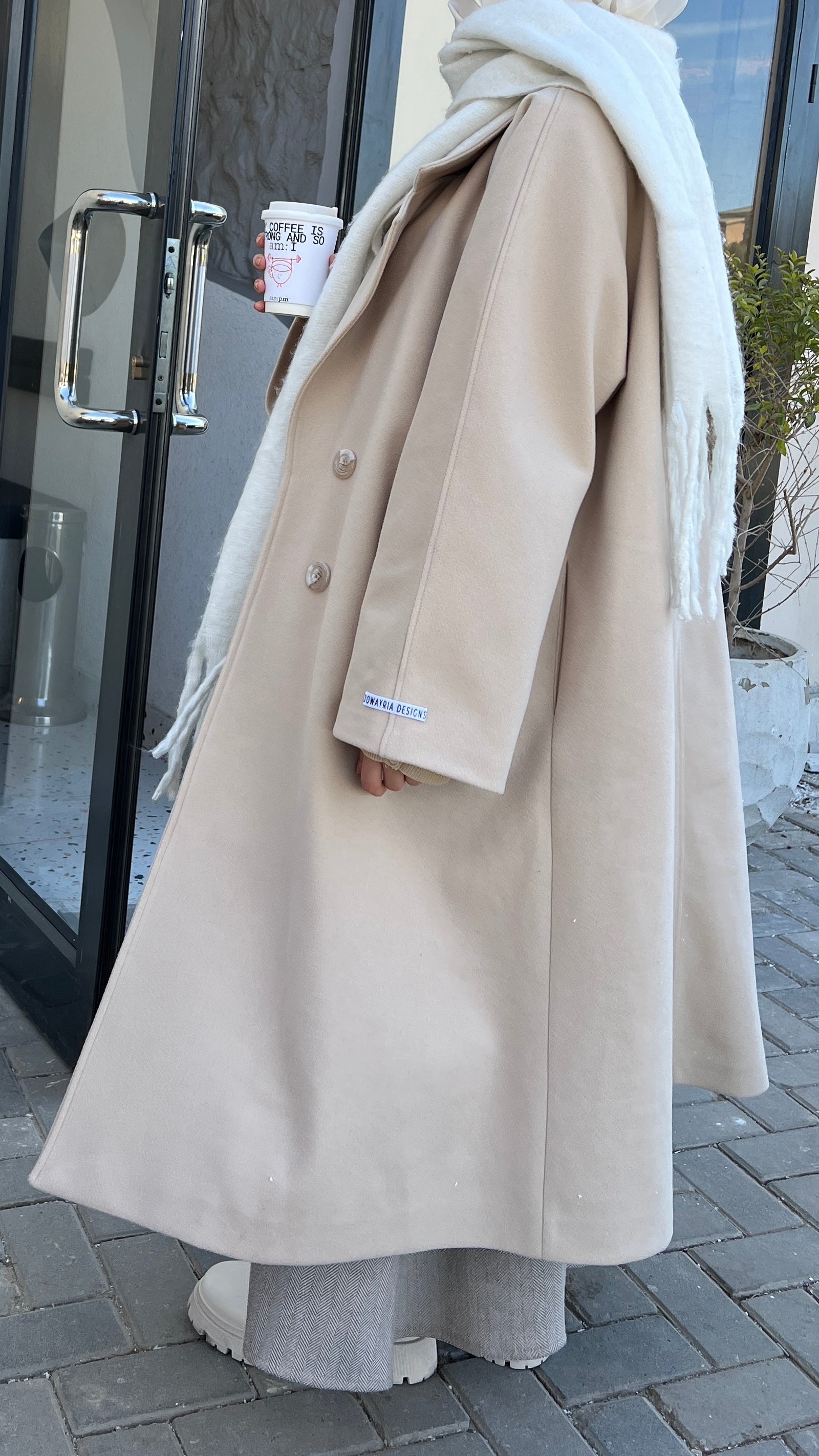 Jowayria’s Elegant Coat