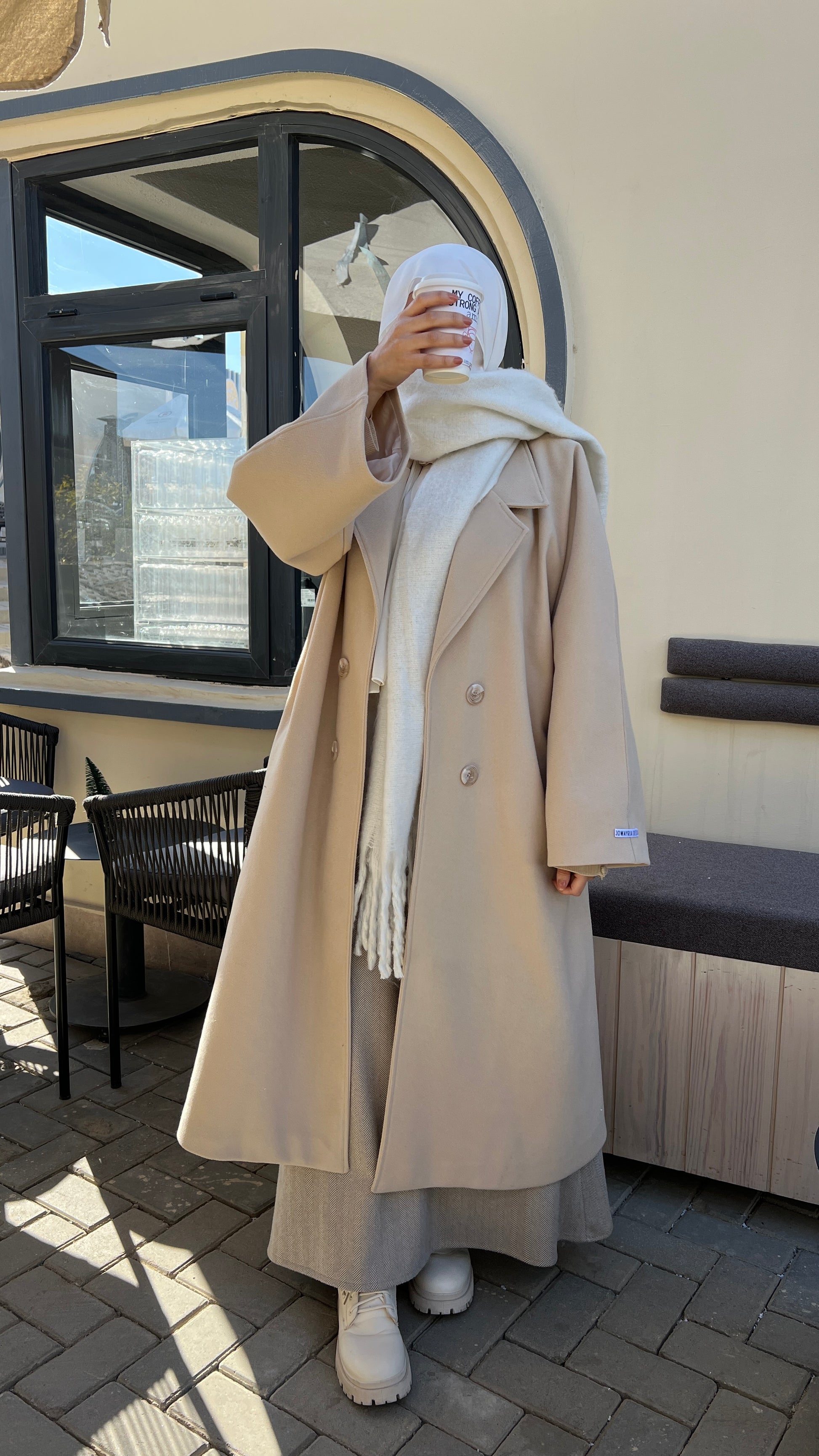 Jowayria’s Elegant Coat