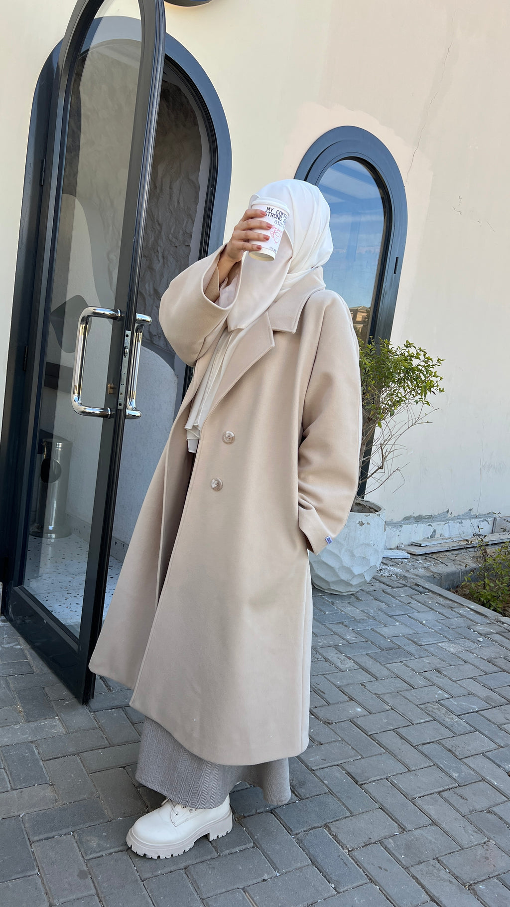 Jowayria’s Elegant Coat