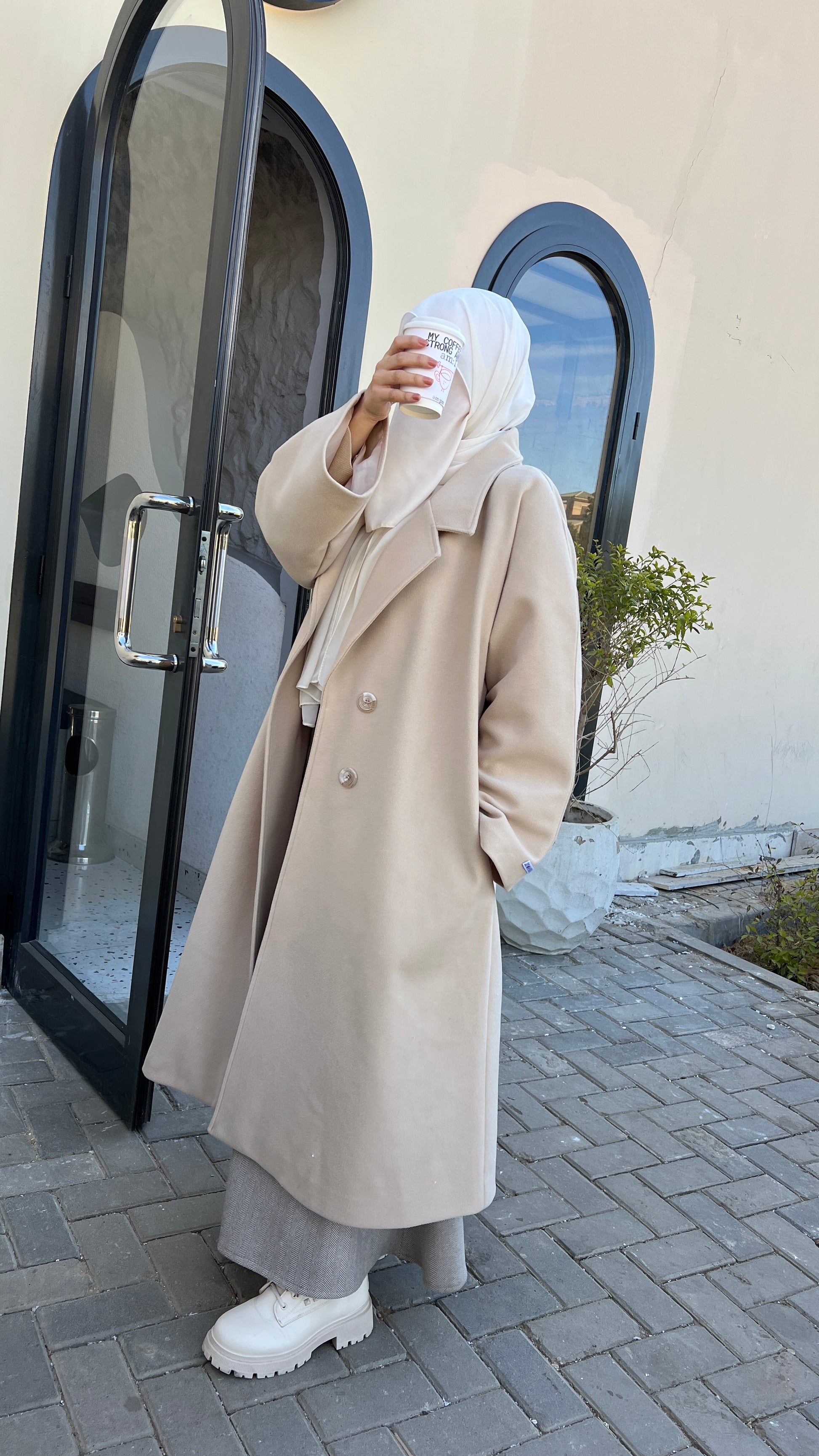 Jowayria’s Elegant Coat