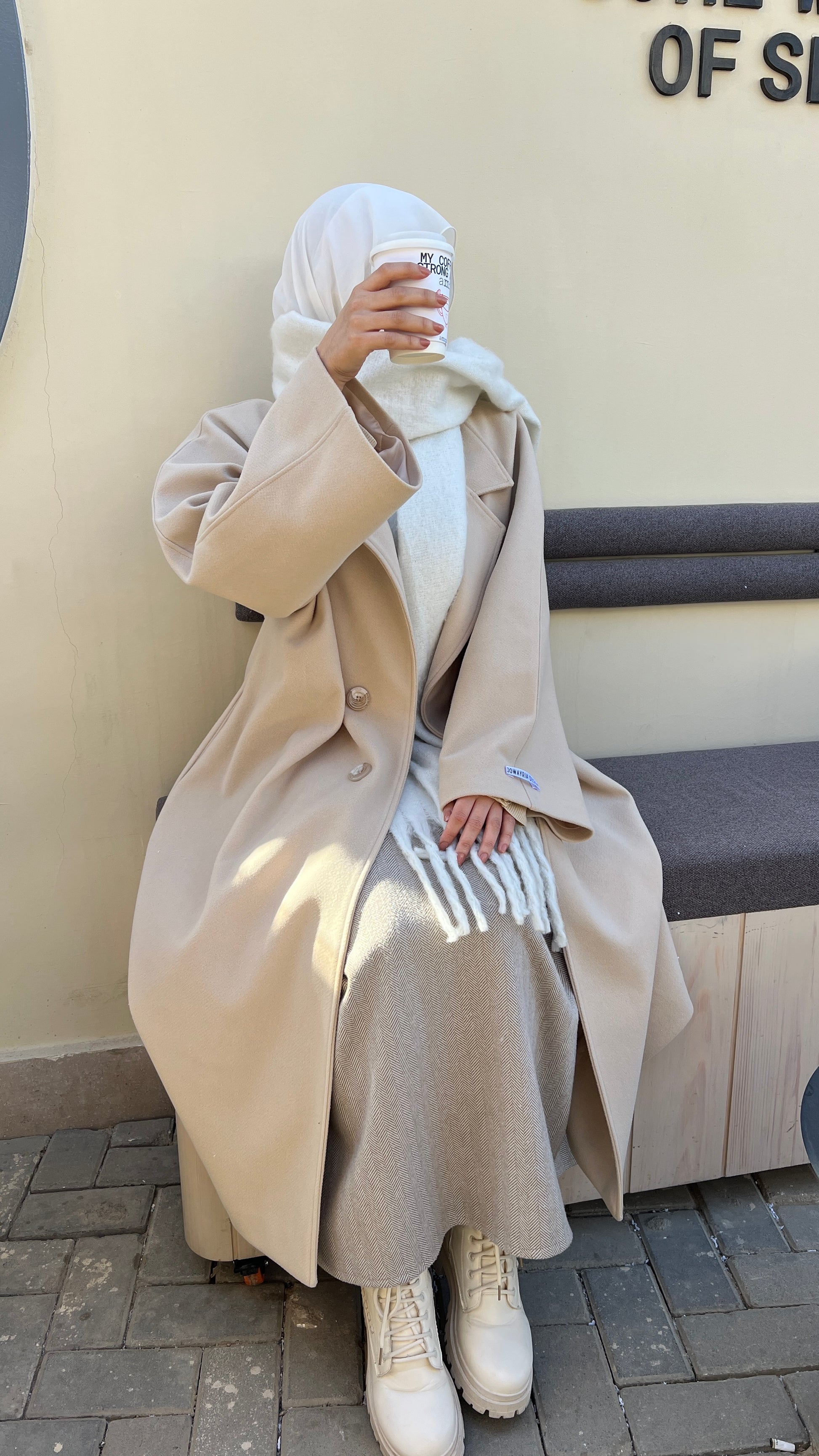 Jowayria’s Elegant Coat