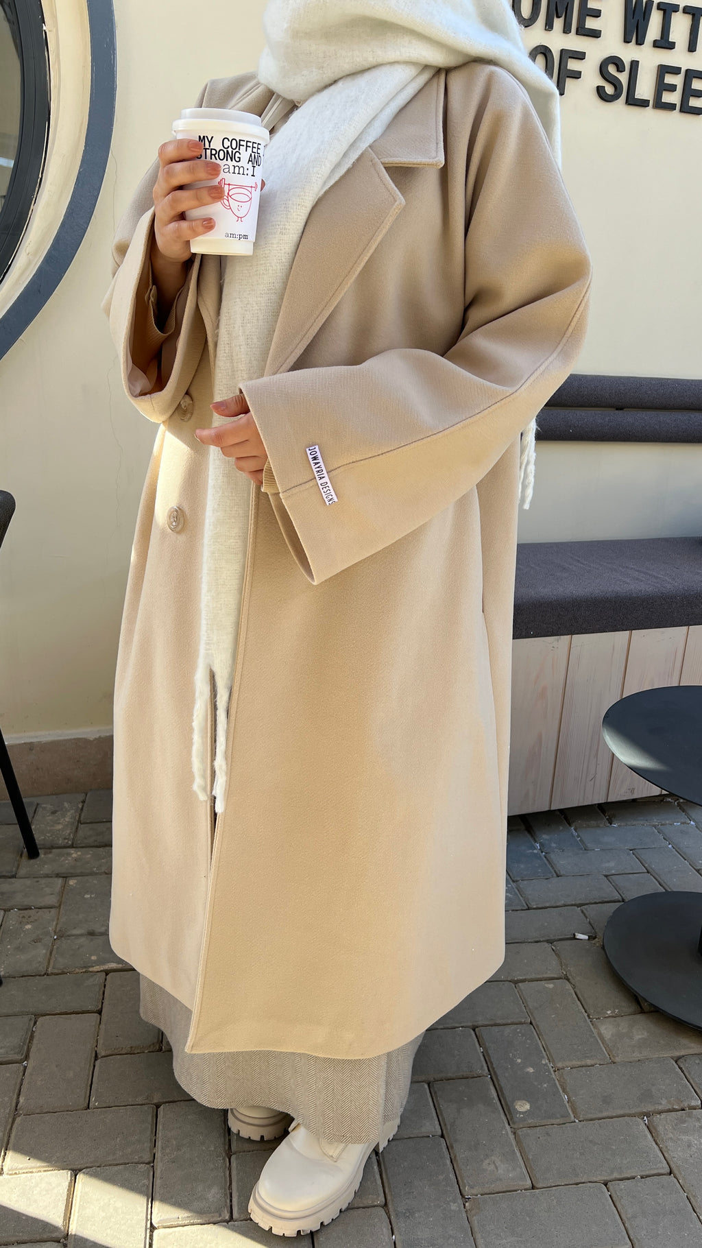 Jowayria’s Elegant Coat