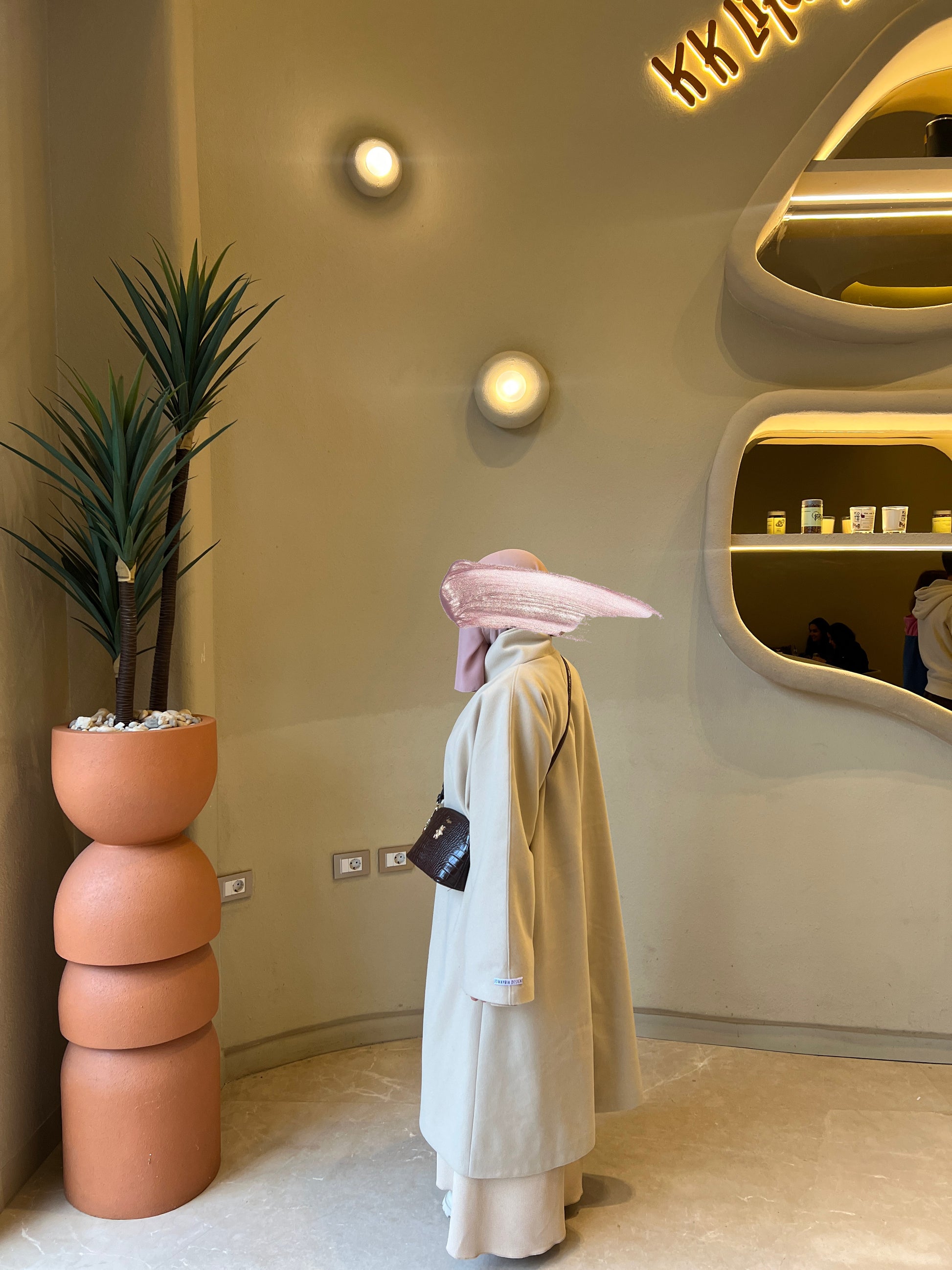 Jowayria’s Elegant Coat